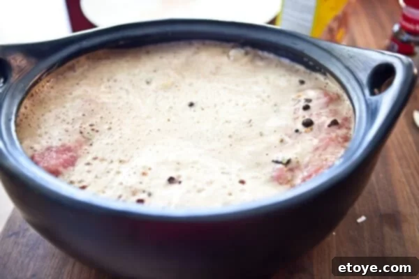 The Ultimate Guinness Corned Beef and Cabbage 10 beer in pot with beef