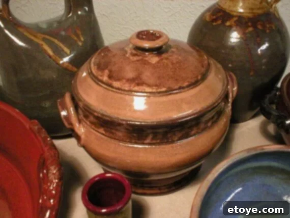 Handmade Stoneware Bean Pot with Blossom Handle by DASRAYPottery