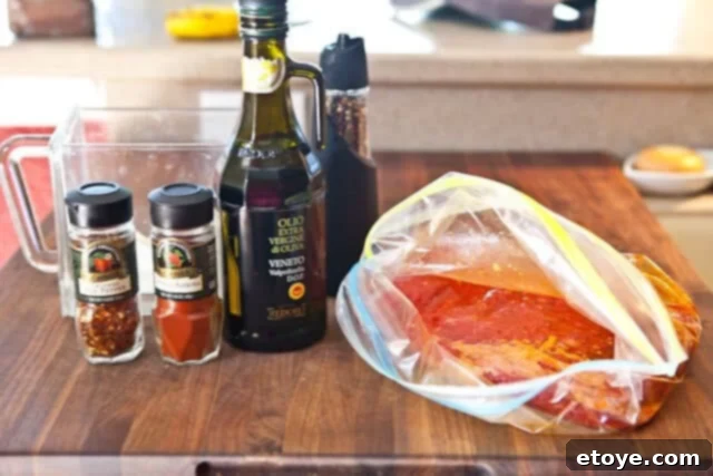 Flank Steak & Chèvre Toasts 11 Flank steak marinating in a flavorful mixture of spices and olive oil.