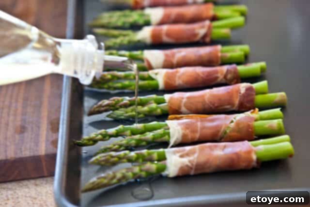 Roasted prosciutto-wrapped asparagus fresh from the oven