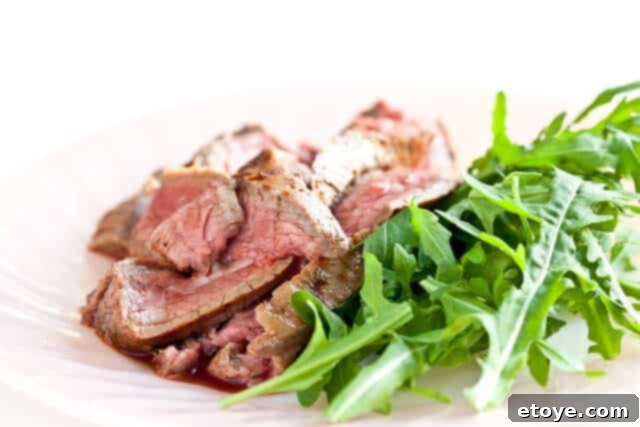 Close-up of grilled flank steak with marinade