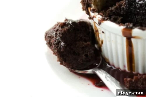 Homemade microwave chocolate banana cake cooling on a rack, quick and easy dessert.