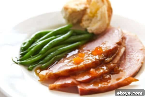 Delicious mango ginger glazed ham centerpiece for Easter dinner
