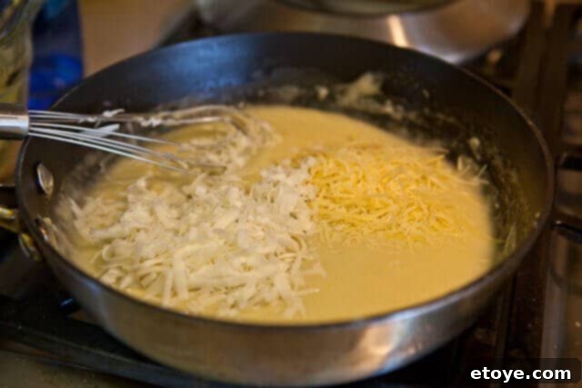 Asparagus Gratin recipe - stir in cheeses Asparagus Gratin recipe - stir in cheeses