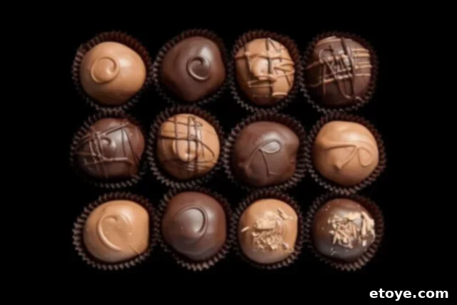 LMCTruffles An exquisite assortment of handmade chocolate truffles from Laughing Moon Chocolates, beautifully presented in a gift box