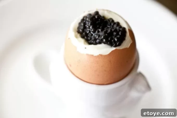 truffle-caviar-8696 Lustrous black truffle caviar pearls showcased in an elegant serving dish, glistening and ready for gourmet plating.