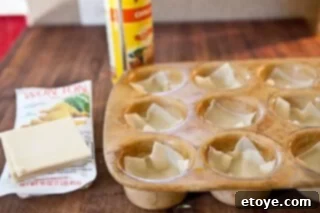 Crispy Baked Crab Rangoon 6 Wonton wrappers in a muffin pan