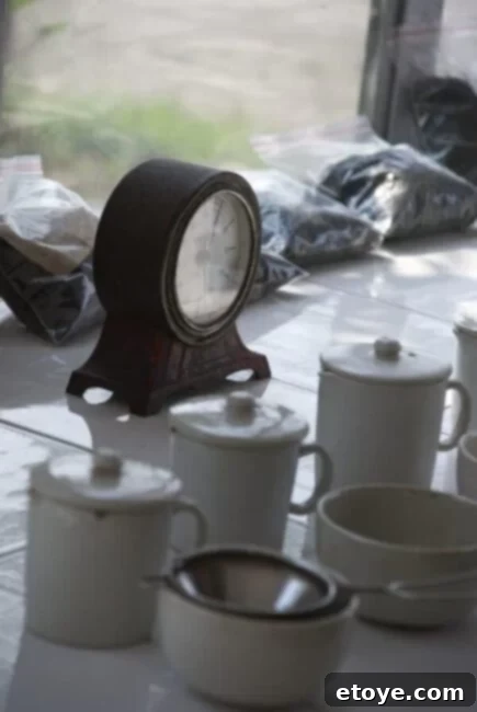 Mastering the Craft of Tea Appreciation 6 Tea being poured into a cup