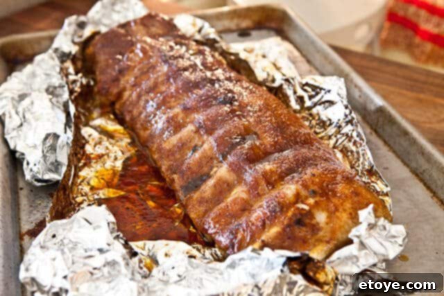 Cayenne Cinnamon Maple Ribs 11 Maple glazed ribs caramelizing under the broiler