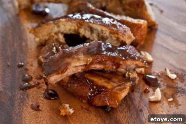 Cayenne Cinnamon Maple Ribs 3 Closeup of perfectly cooked baby back ribs
