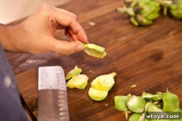 Close-up of baby artichoke slices, showing the ideal thickness.