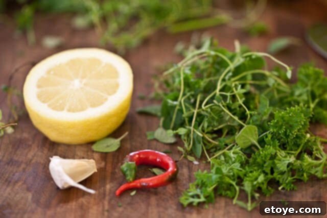 Golden Fried Smelt 9 Aromatic butter, garlic, chili, and herbs sautéing in a pan
