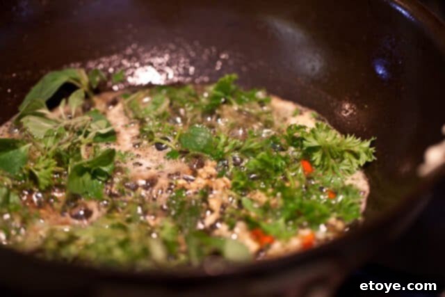 Golden Fried Smelt 10 Fried smelt plated and drizzled with aromatic butter, ready to be served
