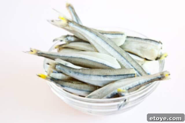 Golden Fried Smelt 3 Matzo meal mixed with garlic powder and salt in a bowl
