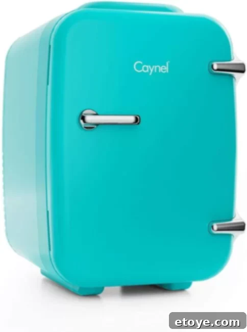Compact cosmetic mini fridge on a countertop, perfect for skincare products and small beverages.