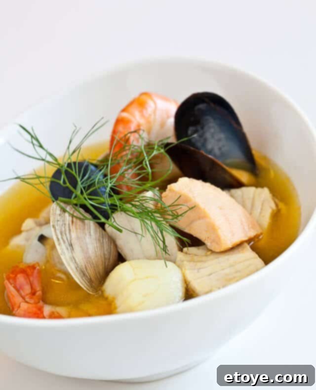 Authentic Bouillabaisse with fresh herbs Classic Bouillabaisse Recipe ready to serve, showcasing vibrant colors and fresh seafood