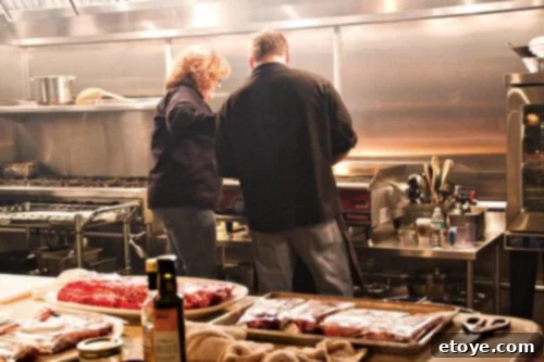Chefs Laura and Eddie observing the steak photography