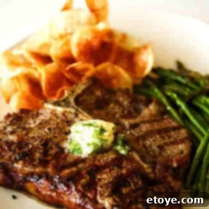 Perfectly grilled steak with garlic herb butter