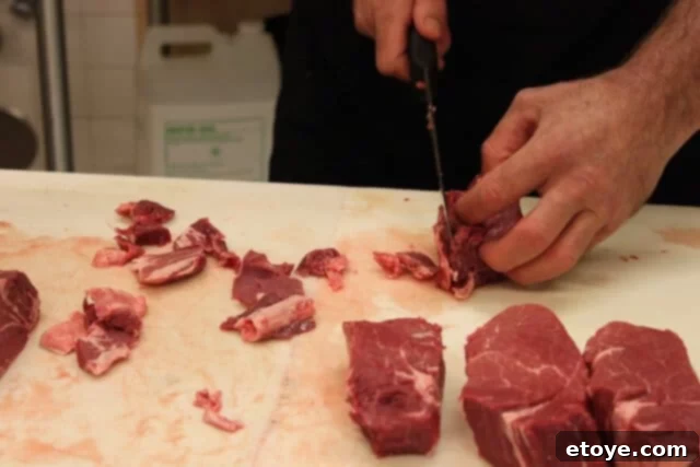 Collection of perfectly trimmed filet mignon steaks, ready for cooking