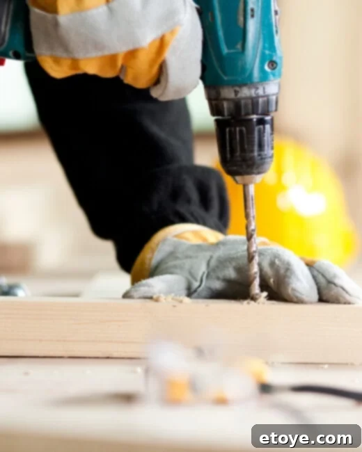 BLACK+DECKER claw hammer, tape measure, and pliers