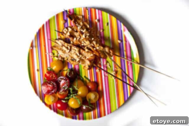 Savory Peanut Chicken Skewers 10 Finished chicken satay skewers topped with peanuts