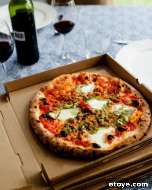 Your Spa Escape A 100 Dollar Gift Card Giveaway 5 Man relaxing in a bath with a drink and tablet on a bath tray