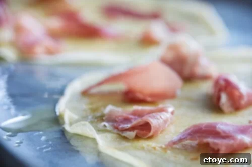 Crispy Crepe Apple Brie Prosciutto Delicious Crispy Crepes with Apple, Brie and Prosciutto ready for serving