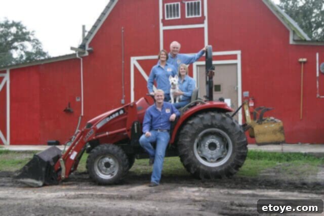 La Caja China Hog Heaven 2 Jim Wood of Palmetto Creek Farm with his family and a Hereford pig