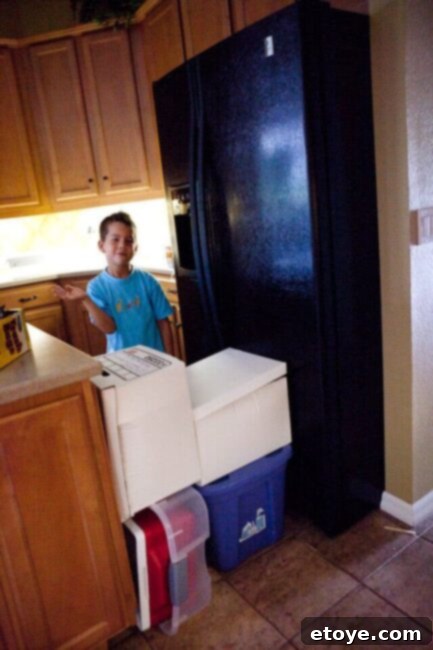 La Caja China Hog Heaven 8 Refrigerator door secured with heavy boxes