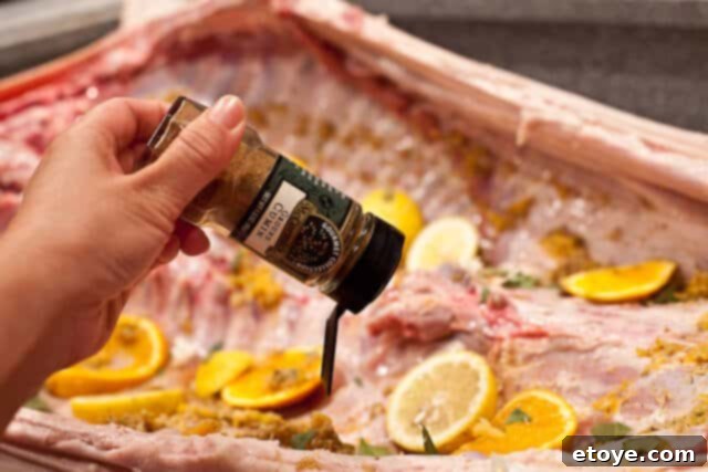 La Caja China Hog Heaven 16 Pig seasoned with citrus, bay leaves, salt, and cumin