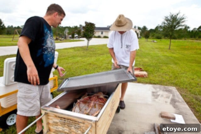 La Caja China Hog Heaven 21 Metal tray placed on top of La Caja China