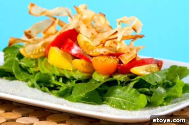 Gourmet Salad Plating Elegantly plated Heirloom Tomato and Avocado Salad on a rectangular dish