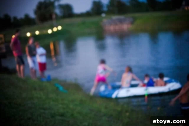 Another blurry image of children on the raft, showcasing their playful escape.