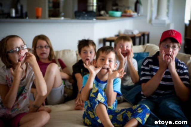 A group of exhausted but happy children after a day full of activities, including their dog Coco.