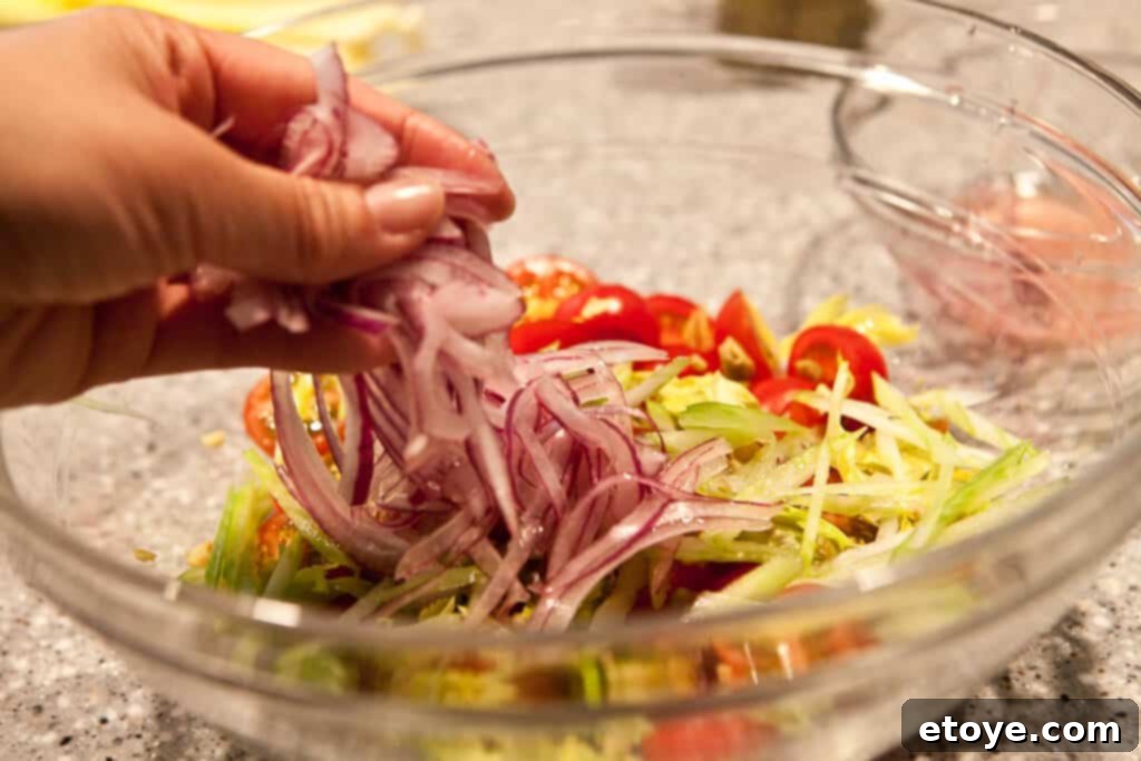 Flank Steak with Bloody Mary Tomato Salad Recipe - Add onions Flank Steak with Bloody Mary Tomato Salad Recipe - Combine onions with salad