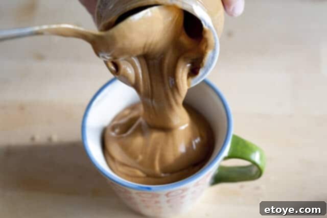 Peanut Butter Pie Cream Cheese Softened cream cheese is added to a bowl with room temperature peanut butter.