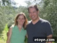 Win an enFuso Gift Basket 4 A man and a woman, Anne and Jon, smiling in a kitchen setting, perhaps the founders or representatives of enFuso.