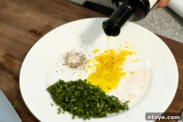 Swordfish with Citrus Herb Crust Recipe Steps - Applying Crust Applying the Citrus Herb Crust to a Fish Fillet