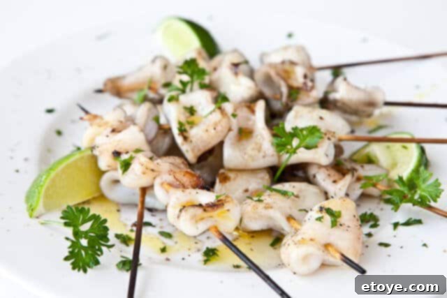 Grilled Calamari on Skewers with fresh lime and herbs