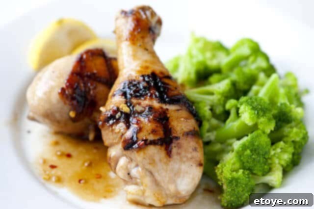 Honey Soy Glazed Chicken on a plate, garnished