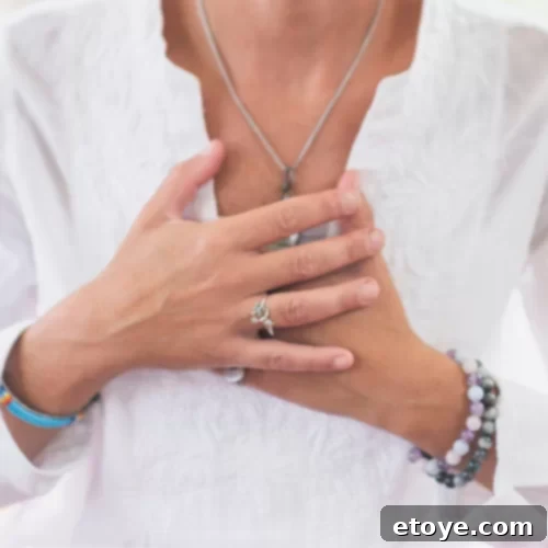 Present Plate 3 A person looking thoughtfully at a plate of healthy food, representing emotional awareness and intuitive eating