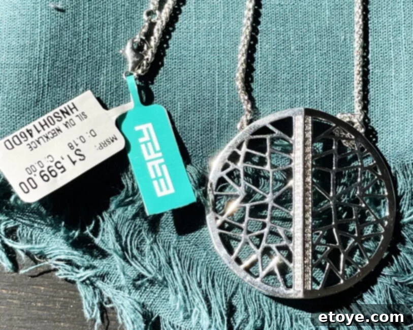 Effy Jewelry Silver Diamond Necklace Ultimate Giveaway 4 A large collection of Effy fine jewelry, including rings, necklaces, and bracelets with various gemstones, meticulously organized in a display case.