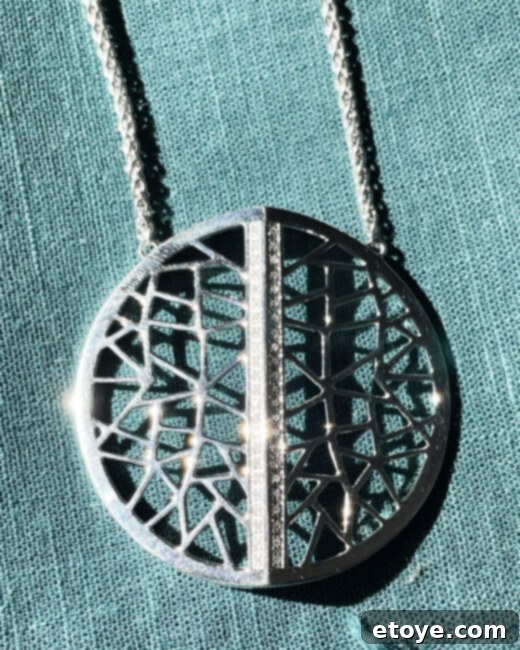 Effy Jewelry Silver Diamond Necklace Ultimate Giveaway 5 Detailed shot of the Effy Final Call Sterling Silver Diamond Necklace, emphasizing its elegant circular design and sparkling diamonds.