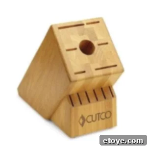 Elegant Cutco knife block, displaying various high-quality kitchen knives with precise slots