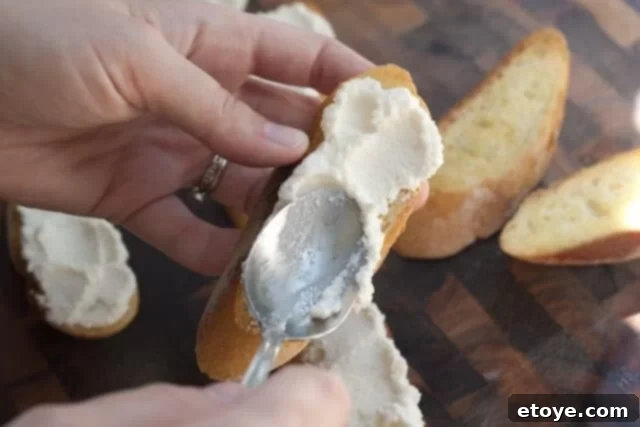 Spreading Ricotta Cheese on Warm Crostinis