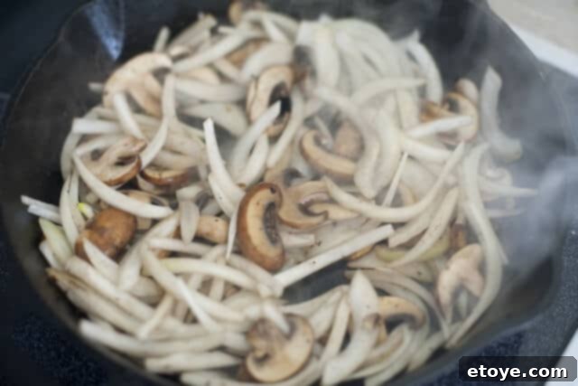 Sautéing Mushrooms and Onions in Pan After Pork Chops
