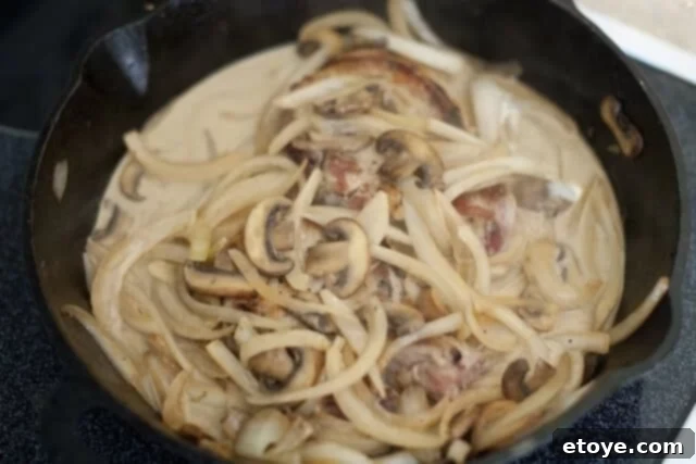 Returning Pork Chops to Sauce and Covering with Foil