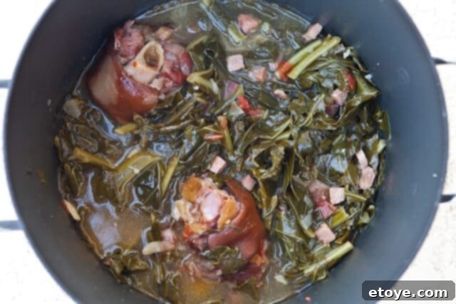 Classic Collard Greens Recipe Easy Collard Greens - a classic Southern side dish, rich with ham hock flavor
