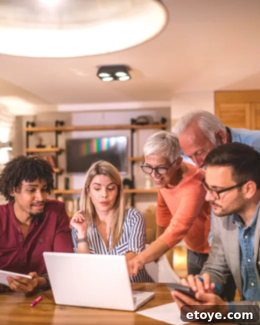 Diverse group of happy, collaborative individuals working together