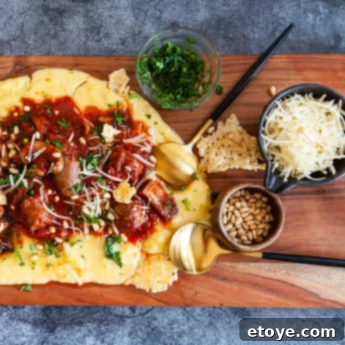 Polenta Board with Sausage and Mushroom Ragu 7 Overhead view of family dinner board